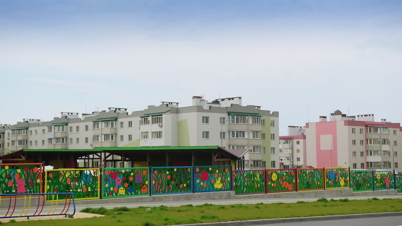 Colorful Playground Fence in a Residential Area