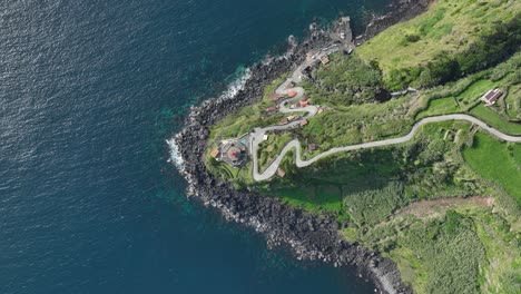 Farol-Ponta-do-Arnel-lighthouse-on-Sao-Miguel-coastline