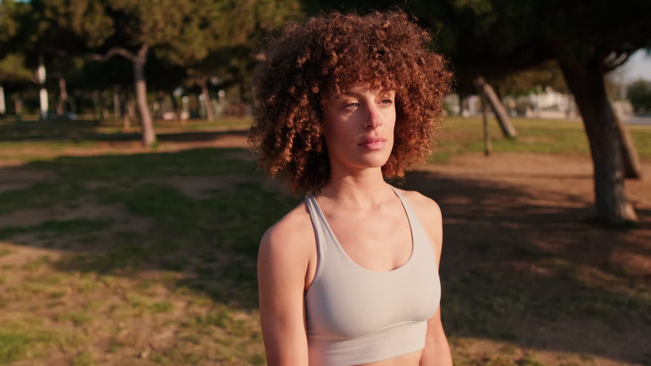Young Woman in Sportswear at Park