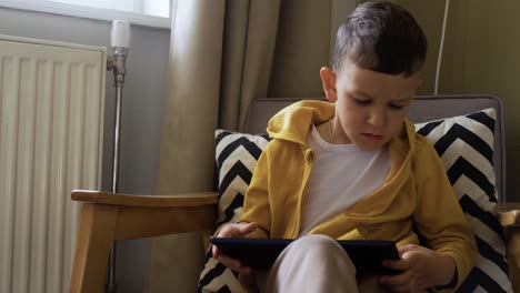 kid sitting on a chair