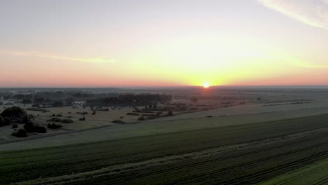 Latvia-Rural-Countryside-Landscape-at-Golden-Hour-Sunset---Aerial-Drone-Flyover