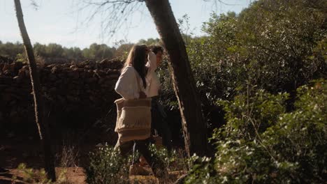 women walking in the forest, sunset landscape slider