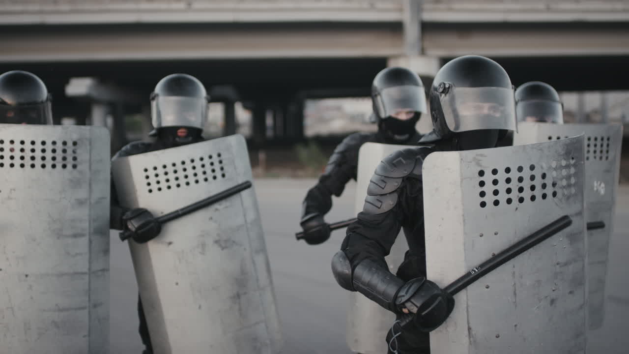 Riot Police with Shields and Batons