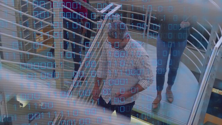 Animation of data processing over diverse business people on stairs in office