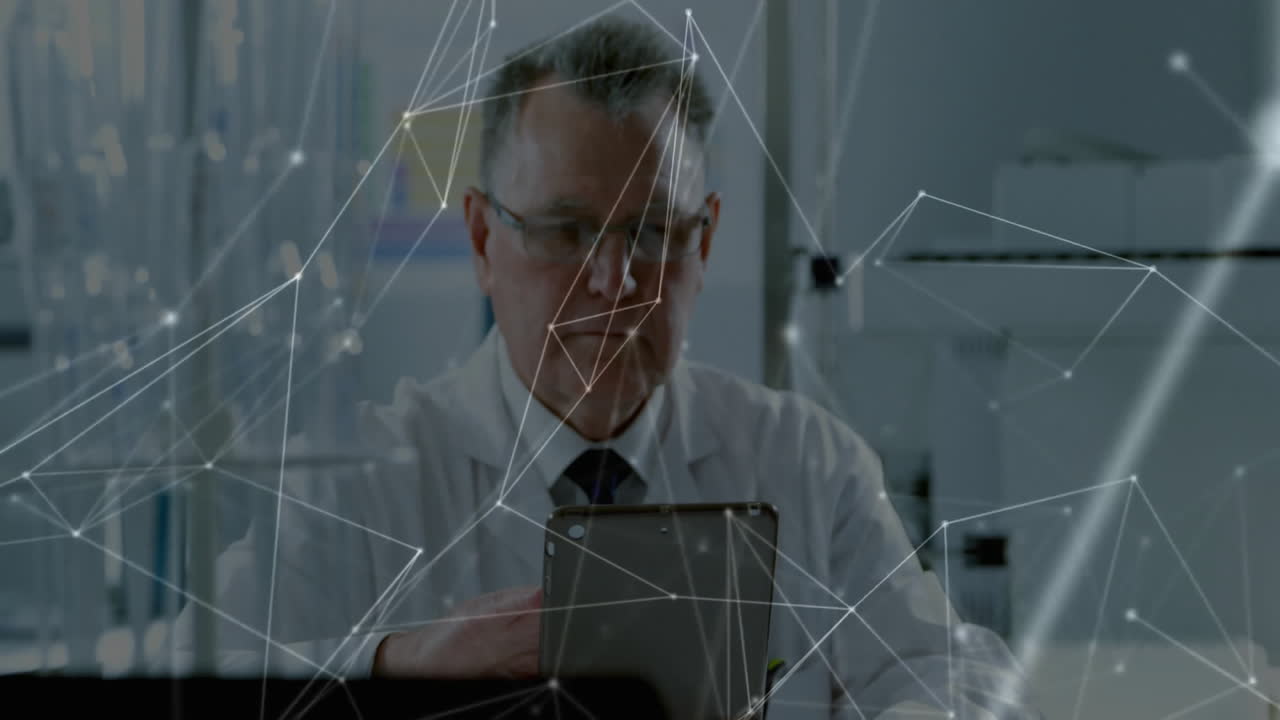 Senior scientist examining tablet in technology lab, interacting with animated data network overlay