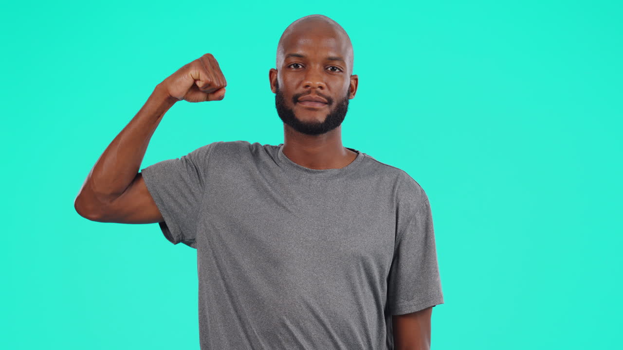 Portrait, arm and bicep with a black man in studio