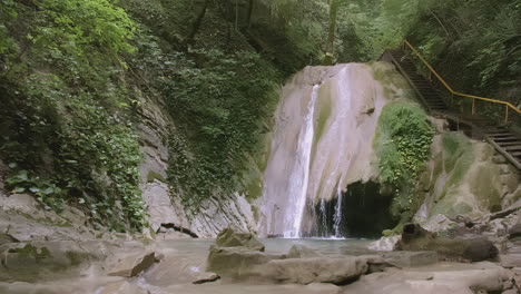 beautiful waterfall in a lush forest