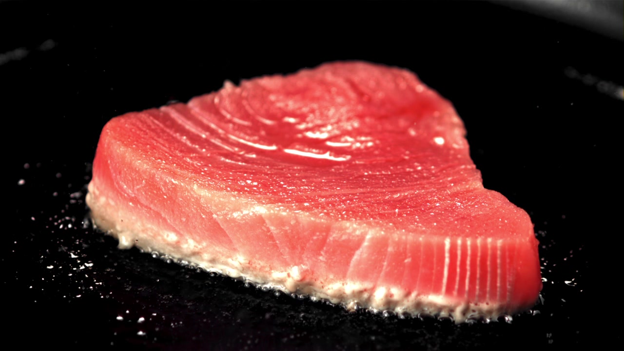 Fresh Tuna Steak Searing on a Hot Pan