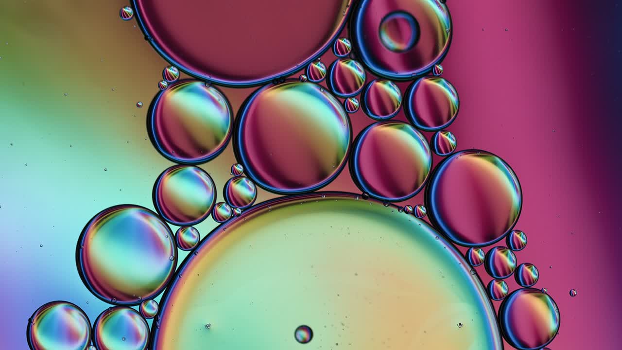 Abstract Colorful Food Oil Drops Bubbles and spheres Flowing