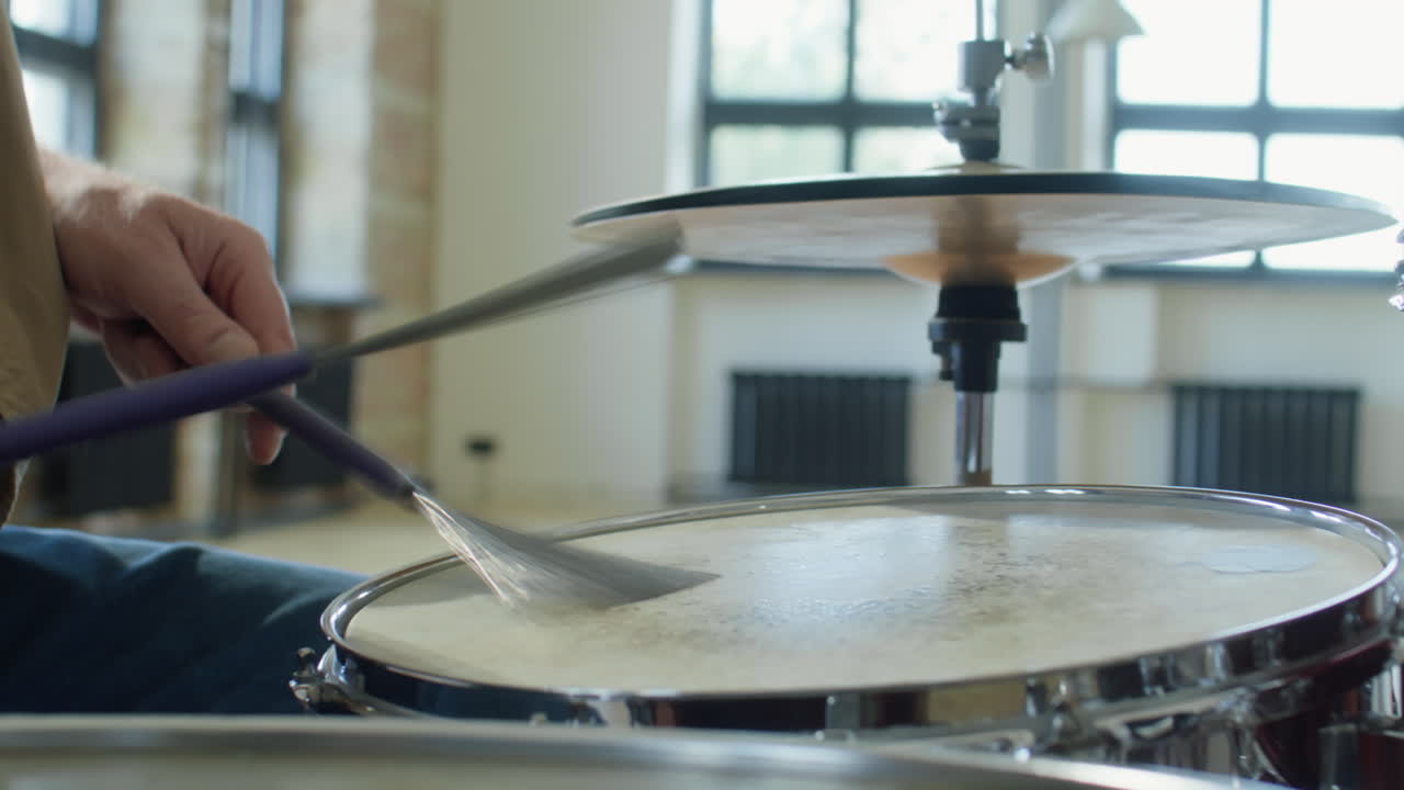 Close Up of Playing Drum with Drum Brushes