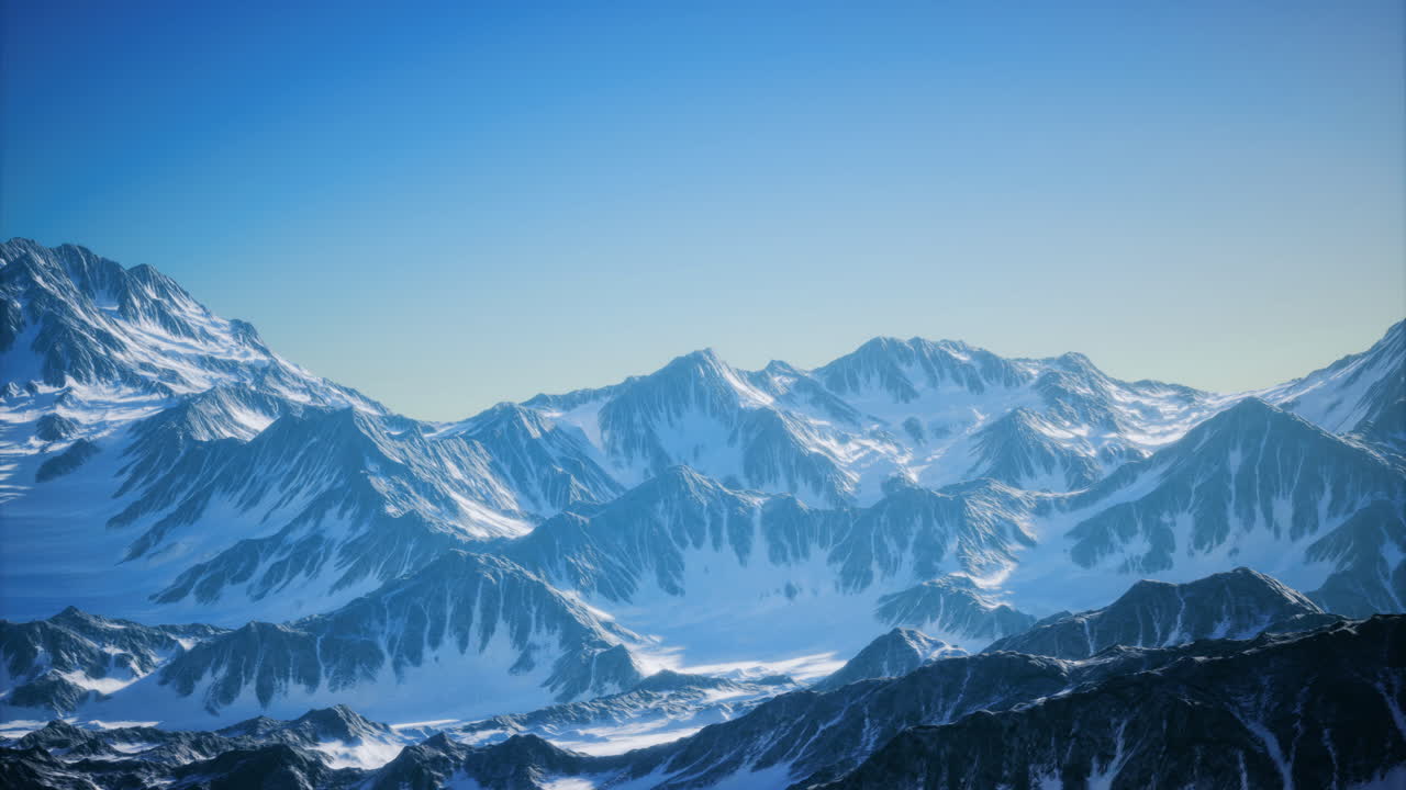 Majestic snow capped mountains under clear blue sky during daytime