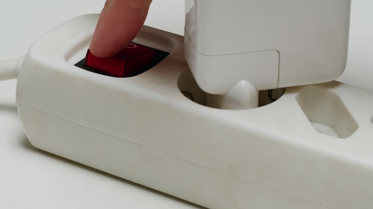 Plugging in a device into a power strip