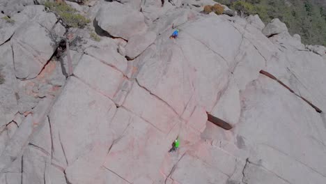 Rock-climbers-on-the-side-of-a-hill-in-Boulder-Colorado