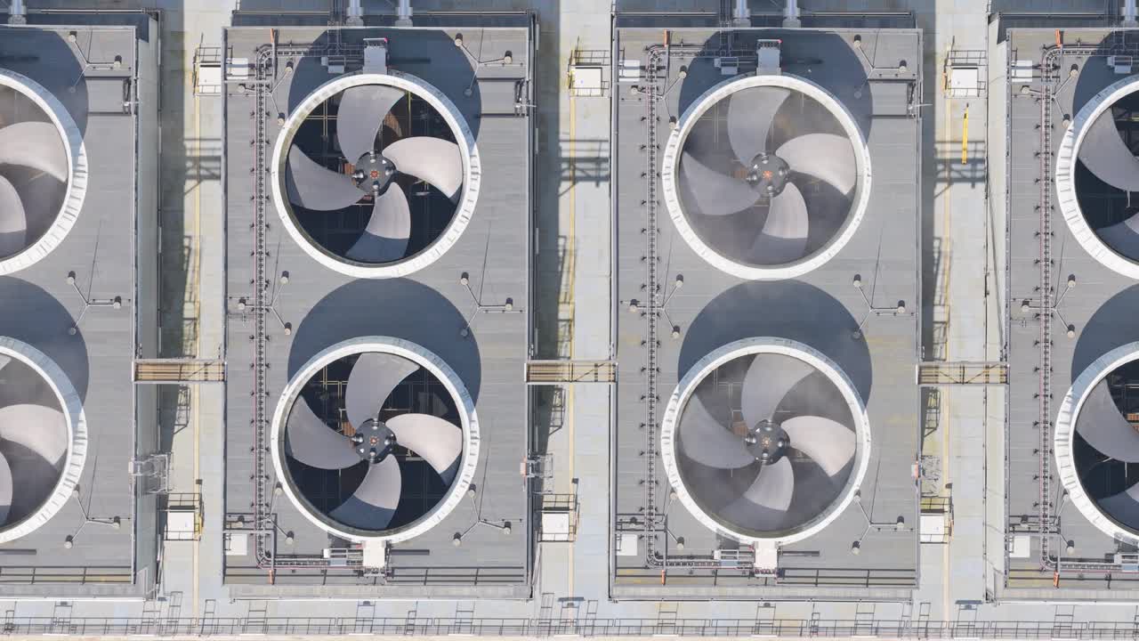 Internet infrastructure hub in Eemshaven, data center rooftop fans, aerial view