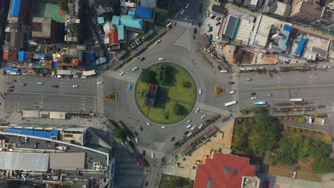 sunny day flight over changsha city center traffic street circle aerial topdown panorama 4k china