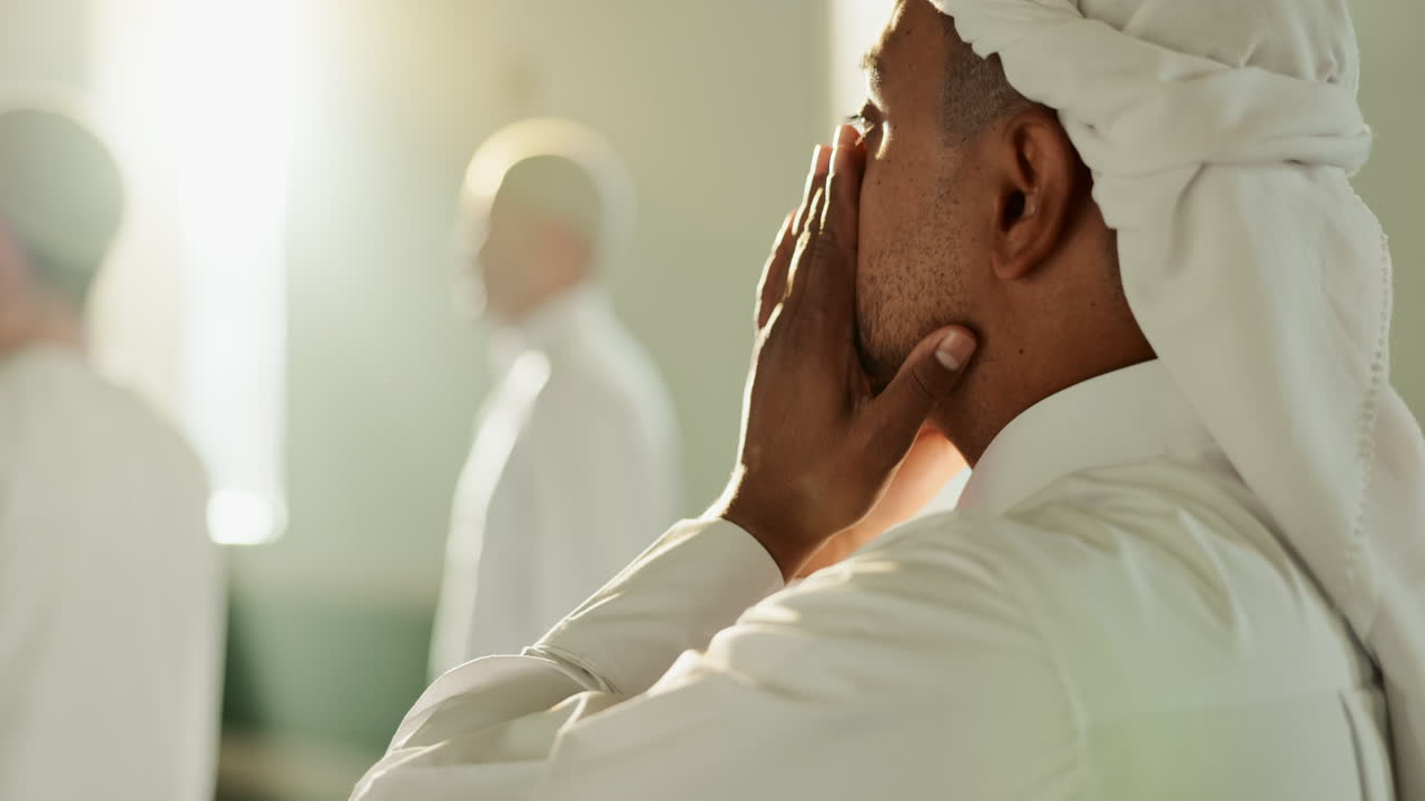 Muslim men praying in a mosque