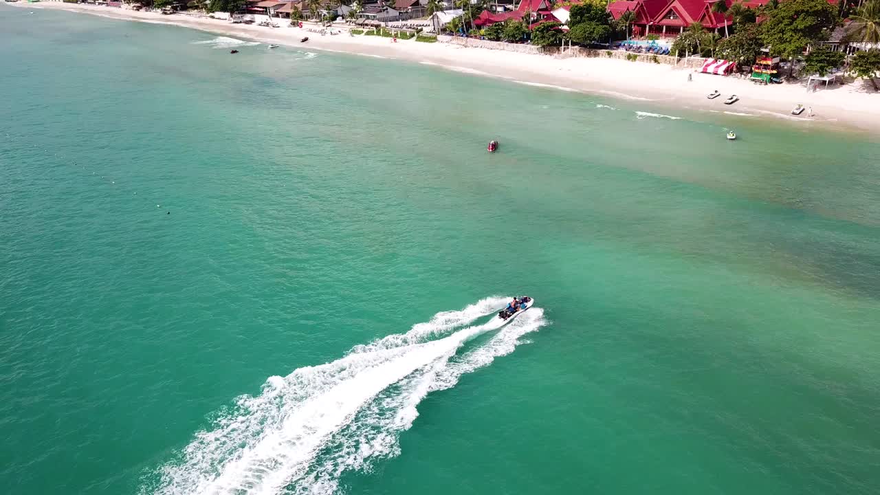 Beautiful Tropical Beach with Jet Skis
