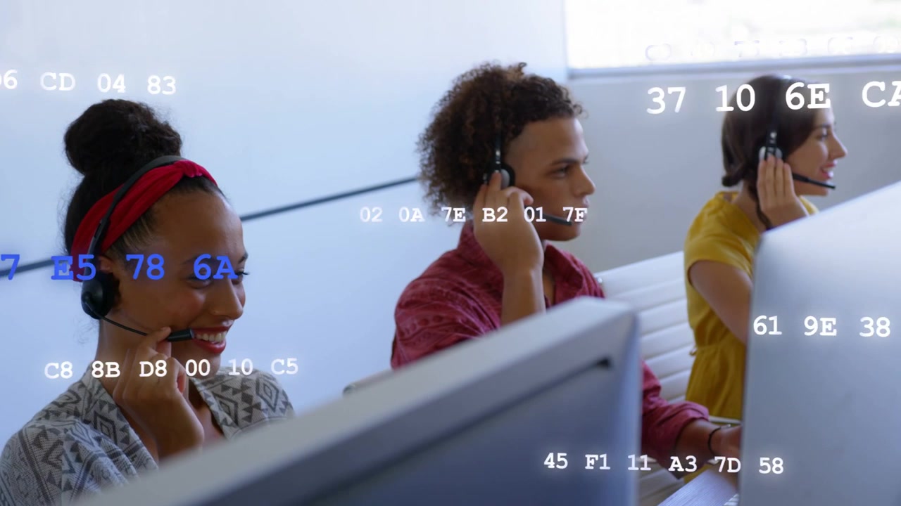 Three call-center agents taking incoming calls at desks on headsets while code overlaying screens