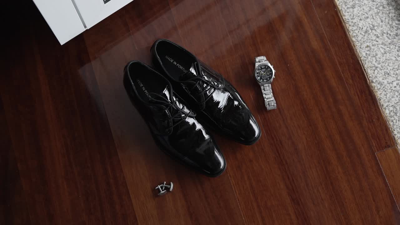 Elegant groom accessories arranged for wedding day