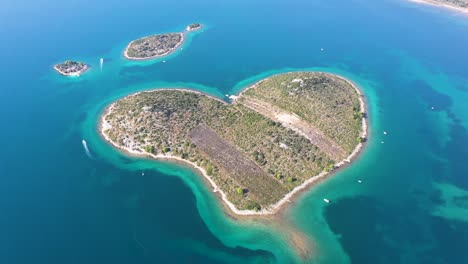 aerial view of the beautiful galešnjak, island of love, lover's island, otok za zaljubljene, love island, heart shaped island in the adriatic sea in croatia