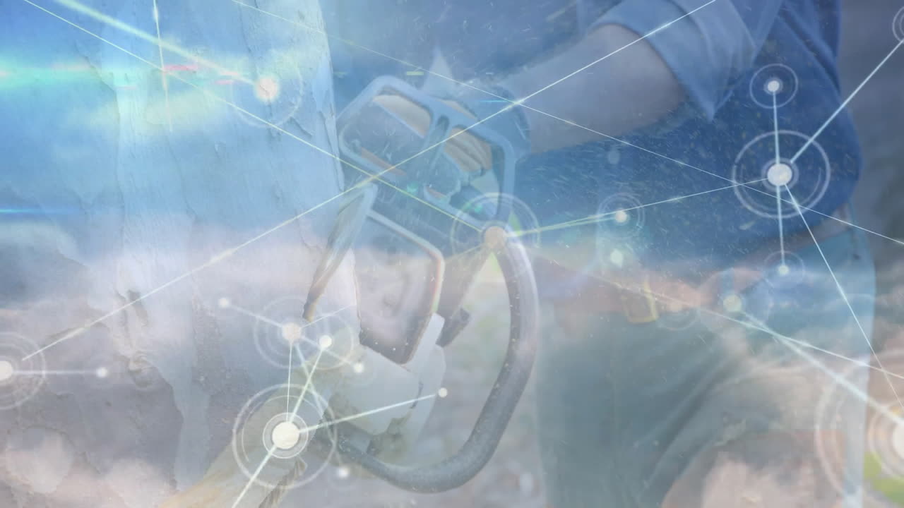 Man operating power cutter in forestry technology scene, showing glowing digital network overlay