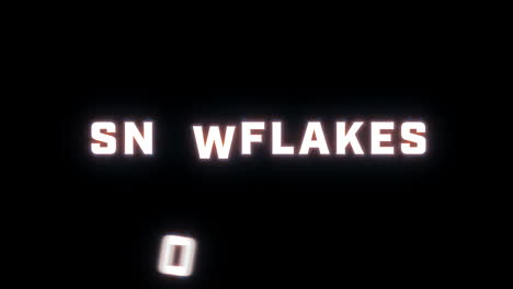 4k text reveal of the word "snowflakes" on a black background