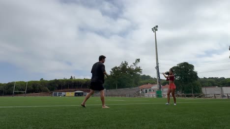 People playing sports on a field