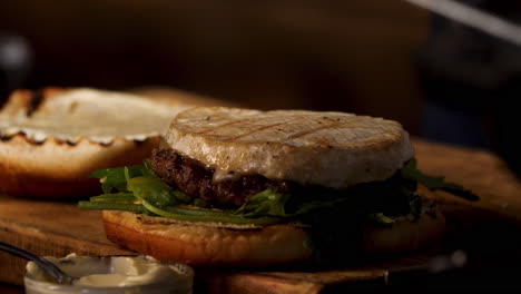 close-up of a grilled camembert cheese burger
