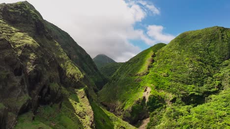 Drone-shot-showing-green-Mountains-on-Asian-Orchid-Island-with-moving-clouds-at-sky,-Asia