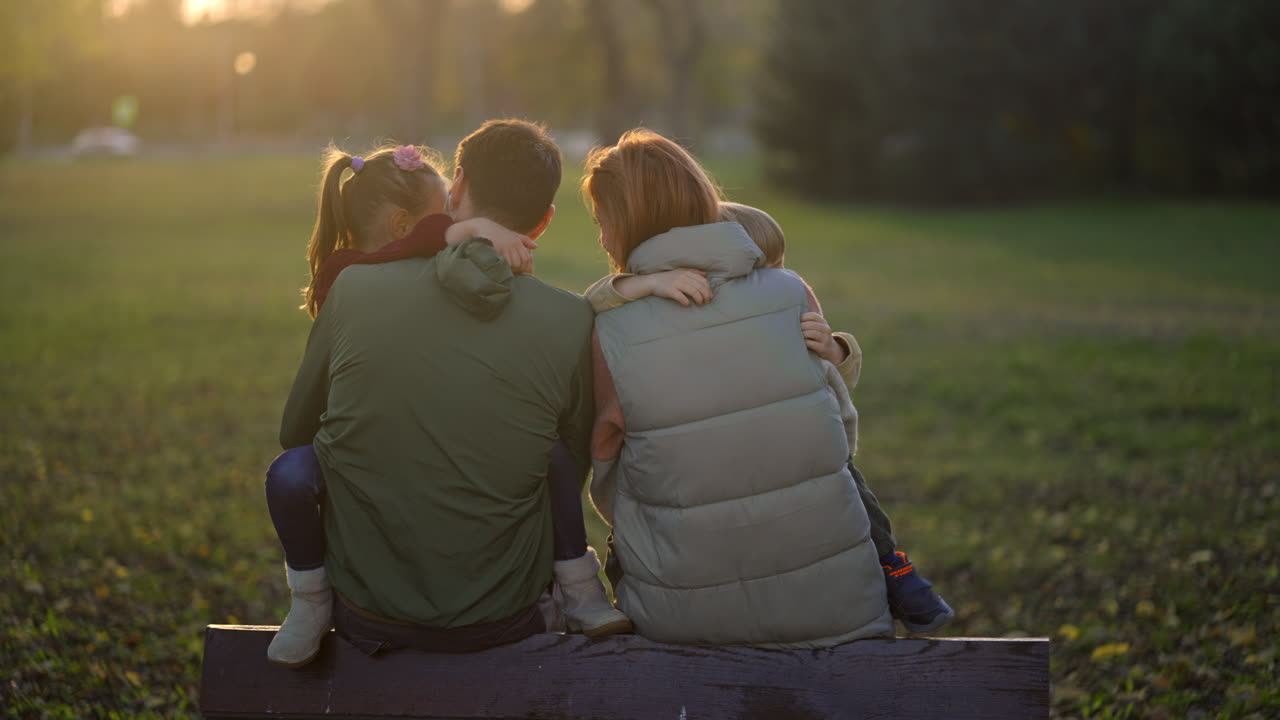 Family bonding in the park during autumn
