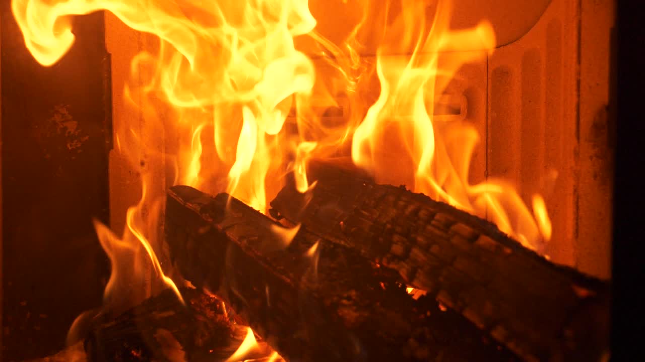 Close-Up of Flames in a Brick Fireplace, Slow motion