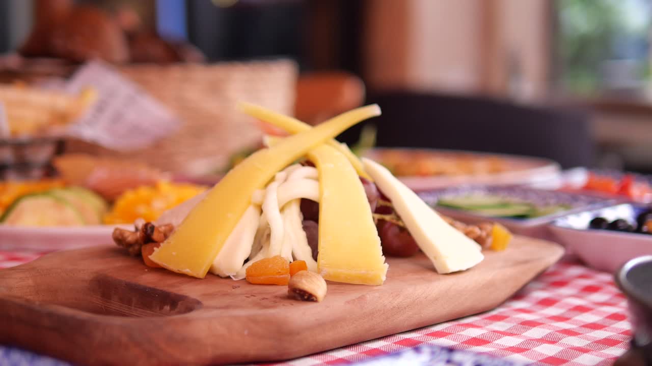 Delicious Cheese Platter with Grapes and Nuts