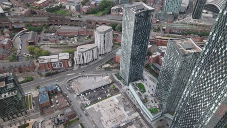 aerial pullback view of deansgate square apartment complex in manchester, uk