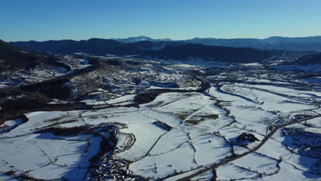 snowy mountain valley aerial view