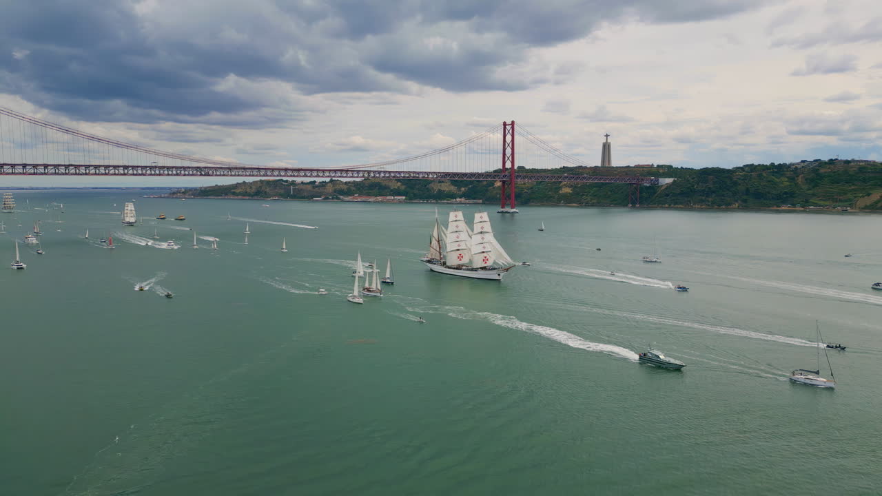 Tourist yachts sailing river at gloomy day aerial view. Lisboa marine cityscape