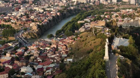 kartlis deda monument in tbilisi city, aerial orbit view