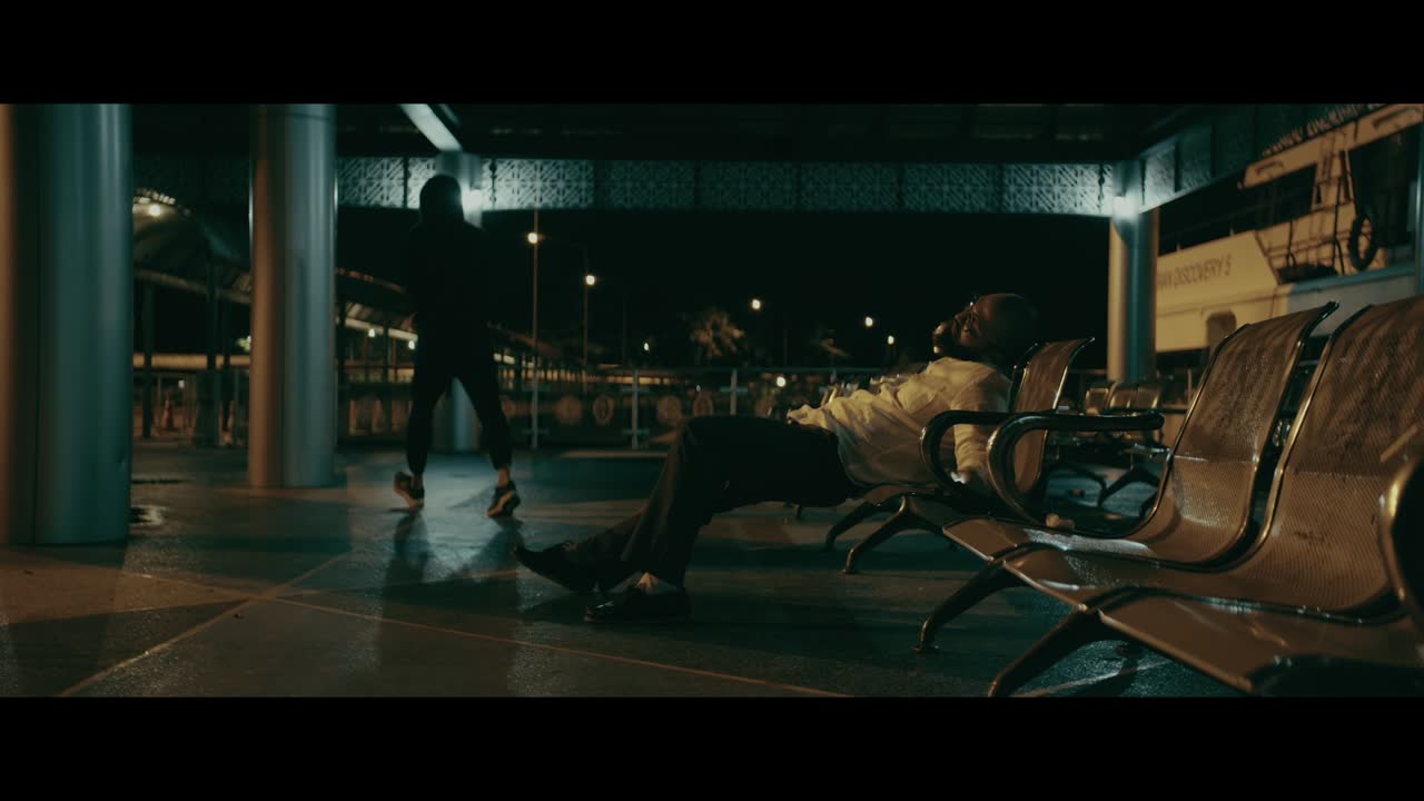 Nighttime Airport Scene with People