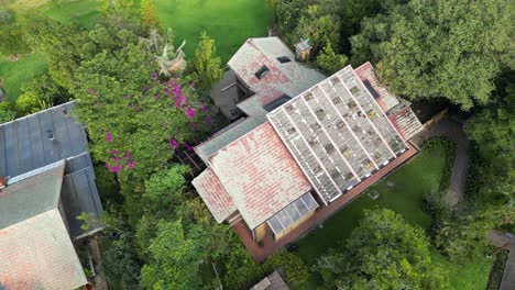 Aerial-View-of-House-with-a-Few-Plants-on-Rooftop-Outside-Bogota,-Colombia