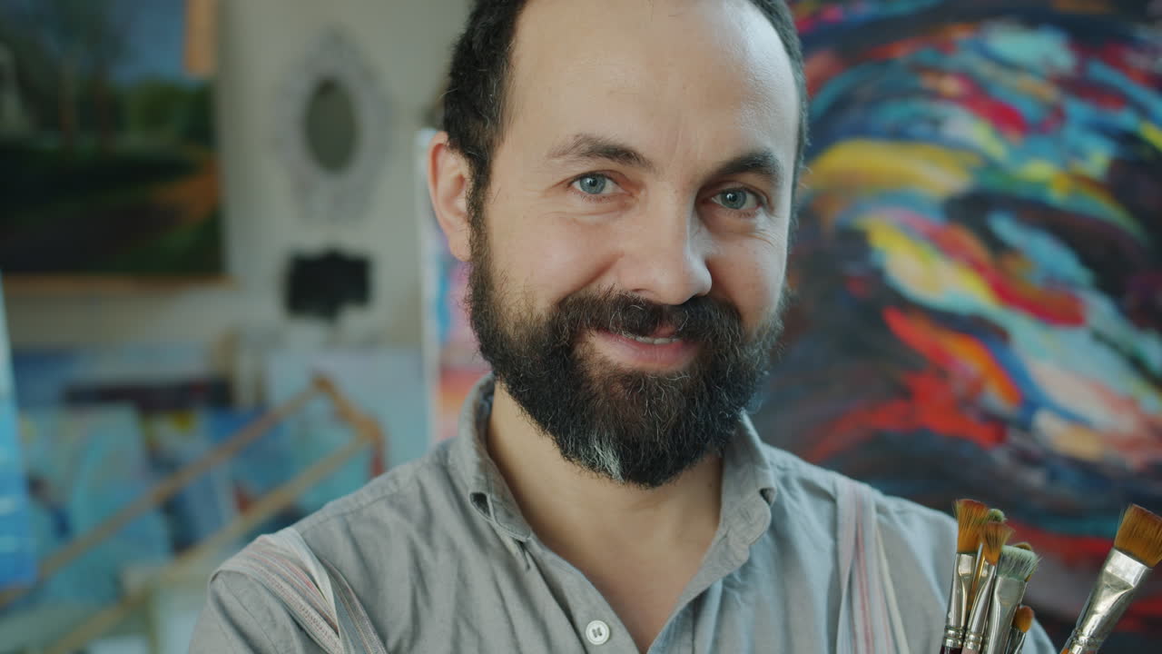 Smiling Artist in Studio