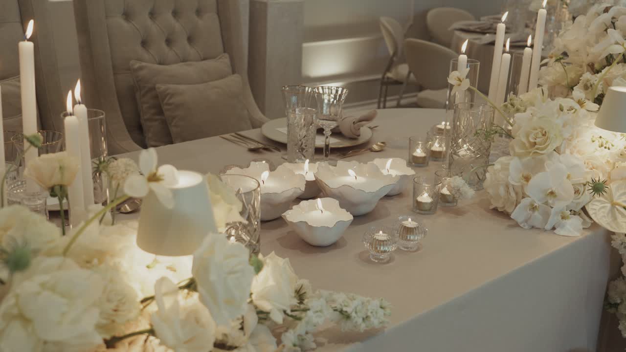 Close up of table number four card on elegant wedding reception setup with soft light