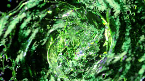 salpicaduras de líquido verde abstracto