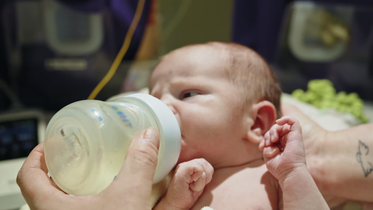 Bottle feeding a premature baby