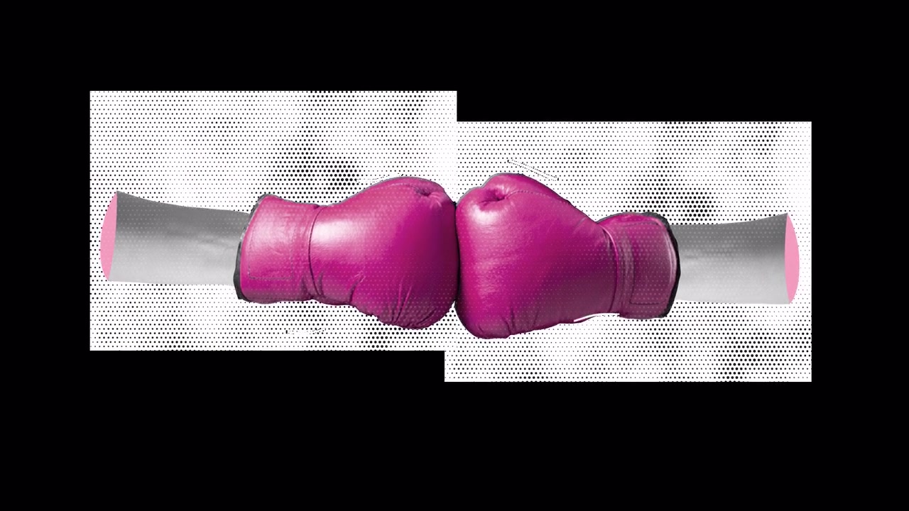 Two Pink Boxing Gloves Touching Together in Studio