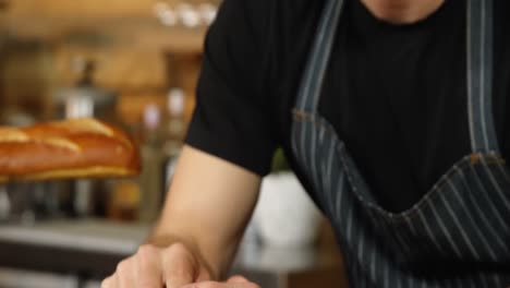 Waiter-using-mobile-phone-at-counter-4k