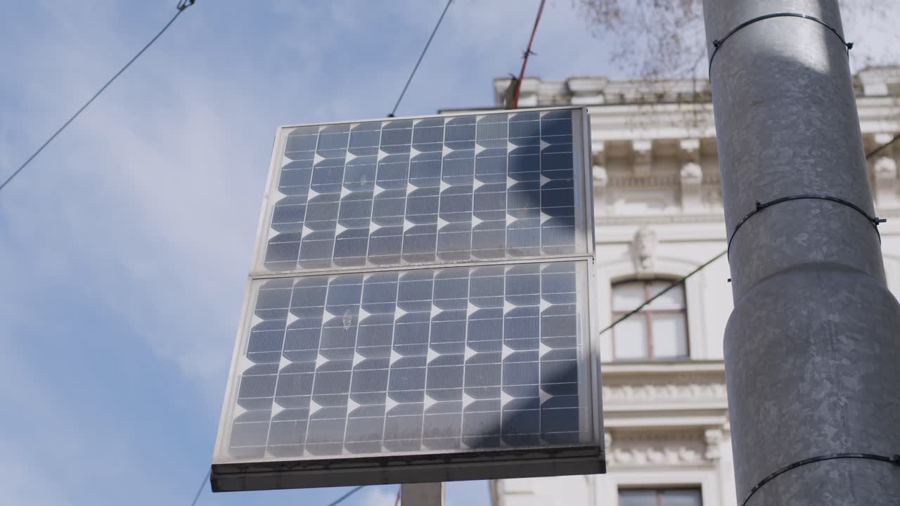 Close-up view of solar street light on pole in Vienna city, urban eco-energy concept