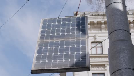 close-up view of solar street light on pole in vienna city, urban eco-energy concept
