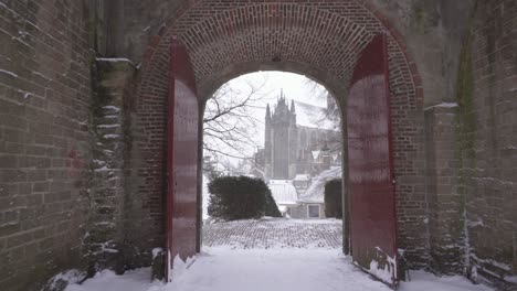 burcht van leiden city gate in winter snow, walking point-of-view pov