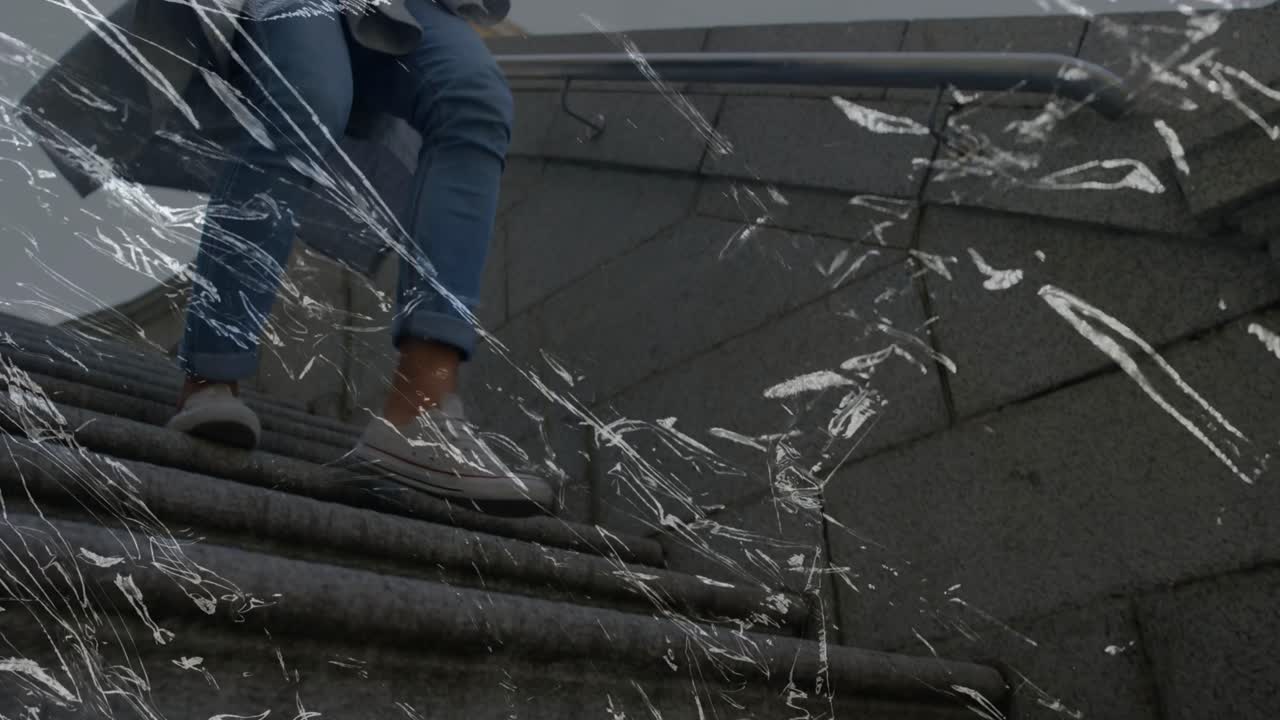 Man descending stairs checking phone for navigation tech, camera closing, scratched film streaking