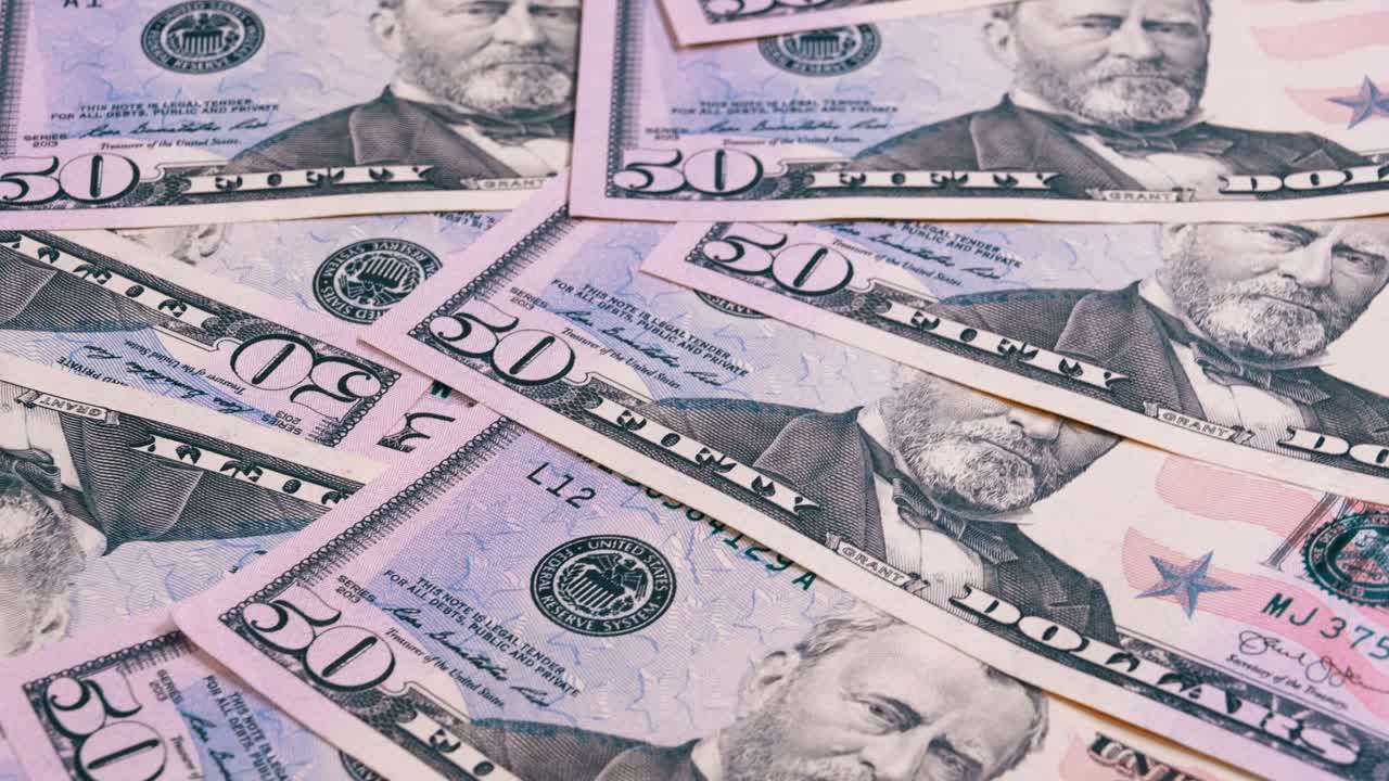 fondo de los billetes estadounidenses de valor de 50 dólares girar