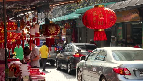 pedestrians shopping in a vibrant street market